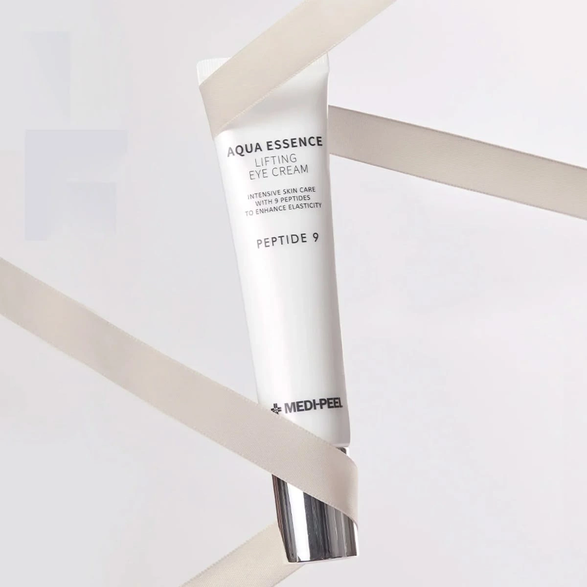 Stangrinantis paakių kremas su Peptide 9 Complex lygesnei paakių odai